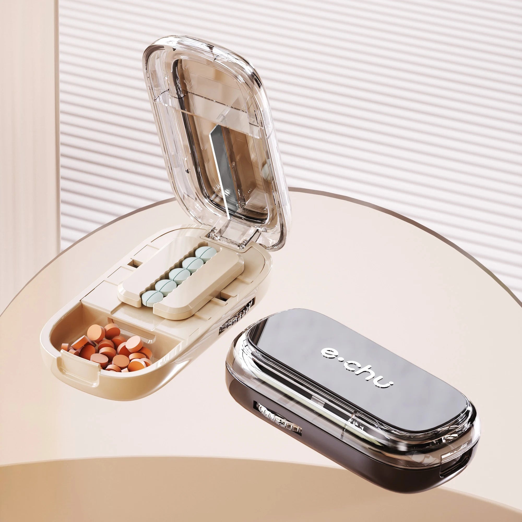 Beige Adjustable Pill Cutter by e.chu with innovative design, open to show multiple pills in the cutting slot and storage compartments.